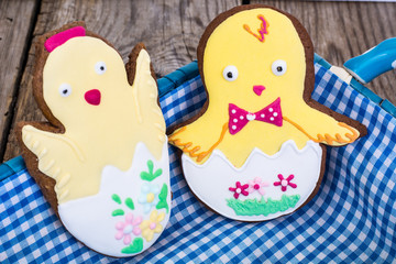 Gingerbread with Easter theme on a wooden background