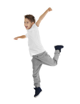 Cute Funny Boy Dancing On White Background