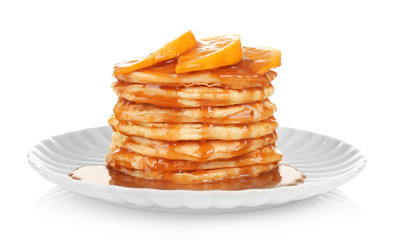 Plate with delicious pancakes on white background