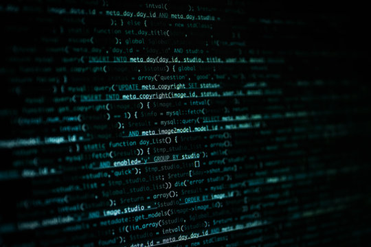 Script code on monitor, closeup. Software development concept