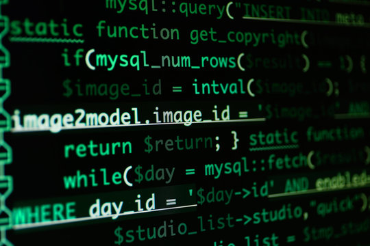 Script code on monitor, closeup. Software development concept