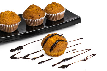 Vanilla mini muffins with chocolate topping
