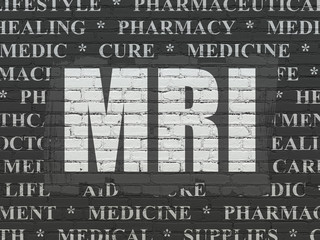 Health concept: MRI on wall background