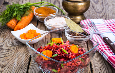 Vegetable salad with carrots, beets, cabbage and onions