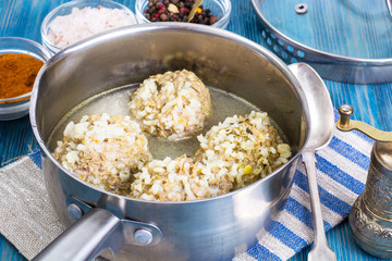 Meatballs with rice in broth