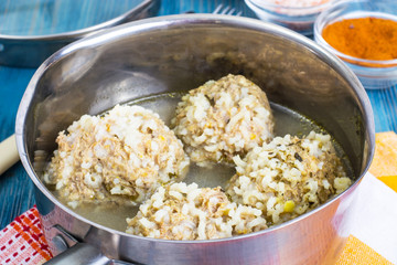 Meatballs with rice in broth