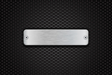 Blank metal button plate. On dark metal perforated background