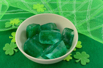 Green ice cubes with green shamrocks for Saint Patrick's Day