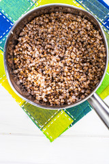 Buckwheat boiled in a metal pot