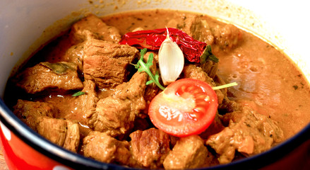 Stew - beef goulash in rustic pot-cruise