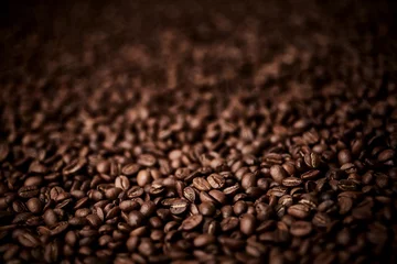 Fotobehang Roasted coffee beans background © Nik_Merkulov