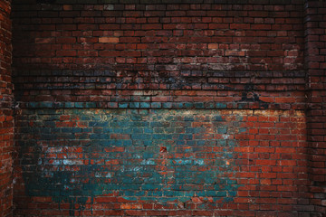 Dark abandoned brick wall. Background texture of a brick. The empty space in the grunge style.