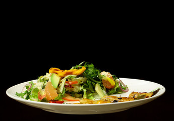 Green salad with fried fish
