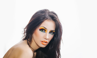 Fototapeta premium pretty sexy woman with fashionable bright orange makeup