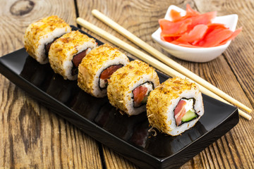 Japanese food rolls with fish and avocado