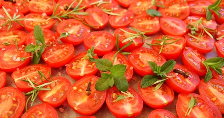 Cherry tomatoes with herbs and spices prepared for dried tomatoes
