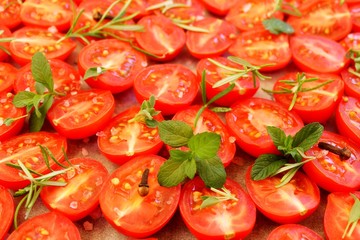 Cherry tomatoes with herbs and spices prepared for dried tomatoes