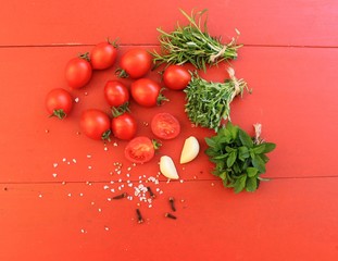 Cherry tomatoes with herbs and spices prepared for dried tomatoes