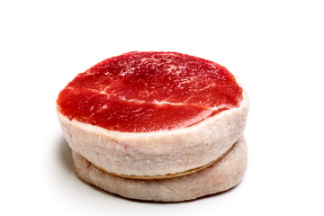 Fillet steak of beef with bacon (Tornado) on a white background. Not isolated.