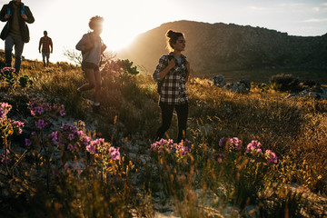 Group of friends are hiking in mountain