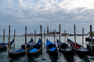 Fototapeta premium Docked gondolas in Saint Mark's Square, in Venice, Italy
