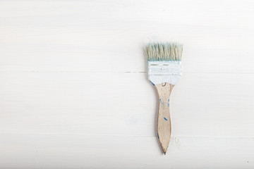 Paint brush on the table, top view
