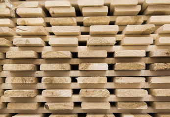image of stacks of lumber . Horizontal shot.