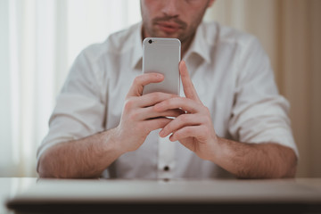 Man is taking a photo on smart phone