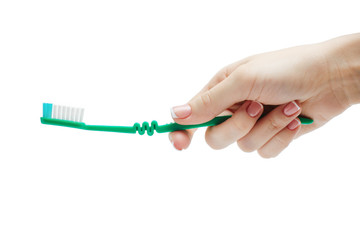 woman manicured hand holding a toothbrush isolated on white background