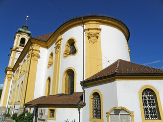 Wilten Abbey Basilica against vibrant blue sky, Innsbruck, Tyrol, Austria 