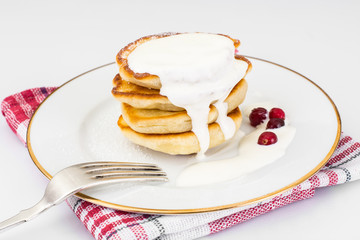 Delicious pancakes with berries and yogurt.
