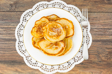 Lush sweet fritters on white plate