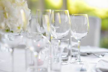 Beautiful table setting with crockery and flowers for a party, wedding reception or other festive event