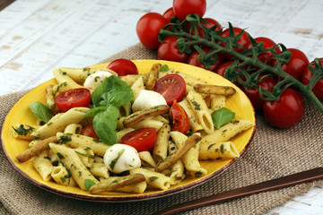 Traditional Italian penne pasta, fresh mozzarella, fresh tomato and sun dried tomato meal