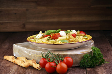 Traditional Italian penne pasta, fresh mozzarella, fresh tomato and sun dried tomato meal