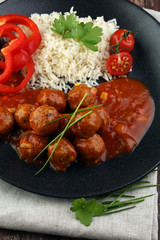 Delicious meatballs made from ground beef in a spicy tomato sauc