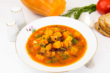 Soup with beans, zucchini, tomatoes and pumpkin
