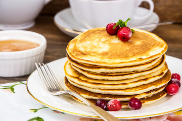 Tasty Pancake with cranberries and honey