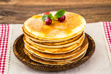 Tasty Pancake with cranberries and honey