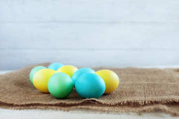 Background with eggs for greeting. The concept of a happy Easter.