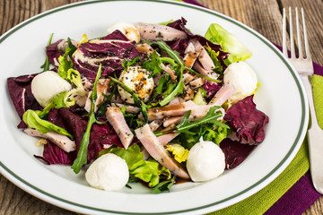Salad mix with sausage, mozzarella, chia seeds