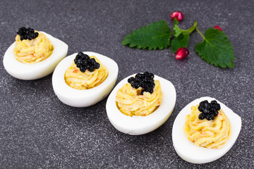 Festive snack stuffed eggs