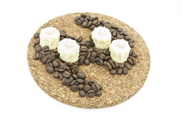 Pieces of chocolate and coffee beans