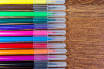 Fototapeta premium Multicolored flomatsery close-up laid out on the table. Stationery.