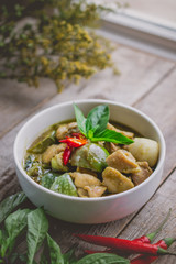 Thai Chicken Green Curry. Famous Thai Tradition Food. Image for Food Advertise in Nostalgic Concept and Rustic Vintage Tone