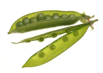 Fresh raw green peas within a pods on white background