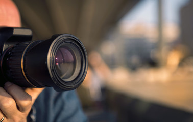 Photographer and a camera