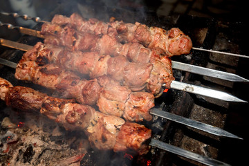 Preparing shashlik on mangal