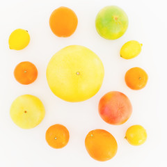 Citrus fruits isolated on white background. Flat lay, top view. Summer background