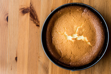 Homemade New York Cheesecake in cake mold copy space.